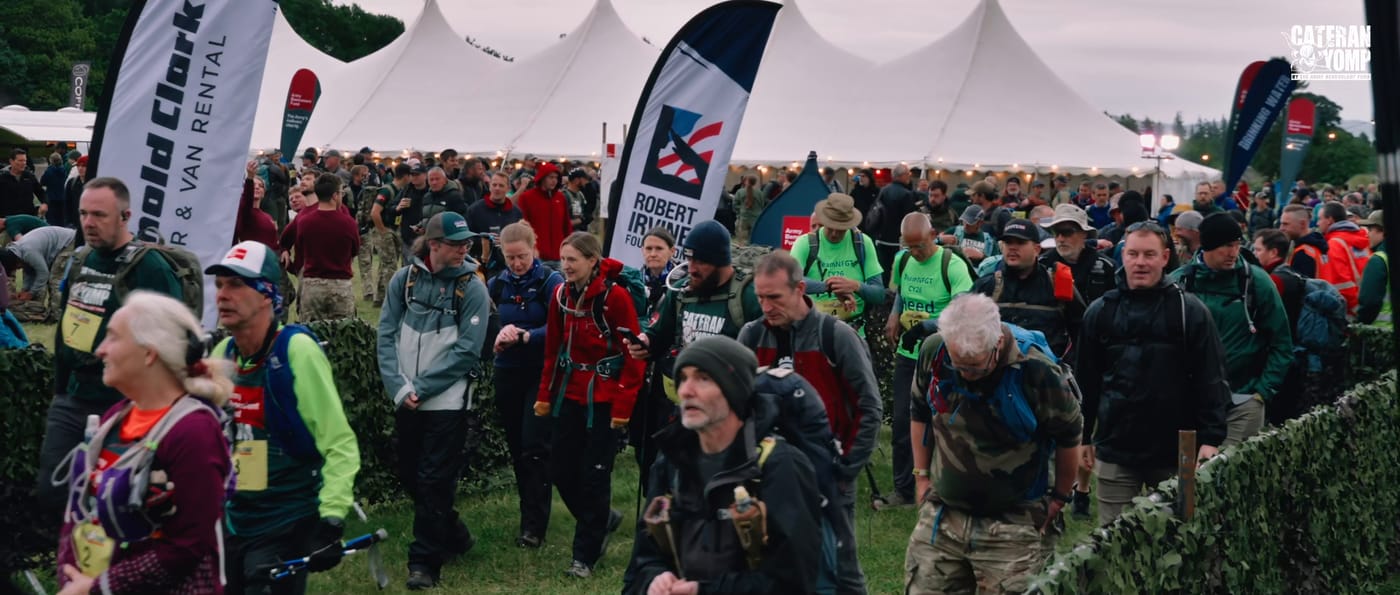 The mass start at Blairgowrie, hundreds of walkers moving off between the event tents and sponsor flags.